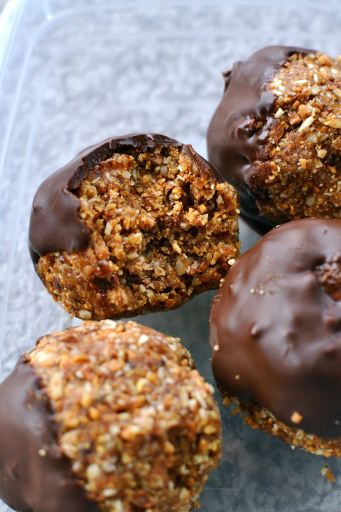 vegan gluten free coconut almond bliss balls snack balls dipped in chocolate