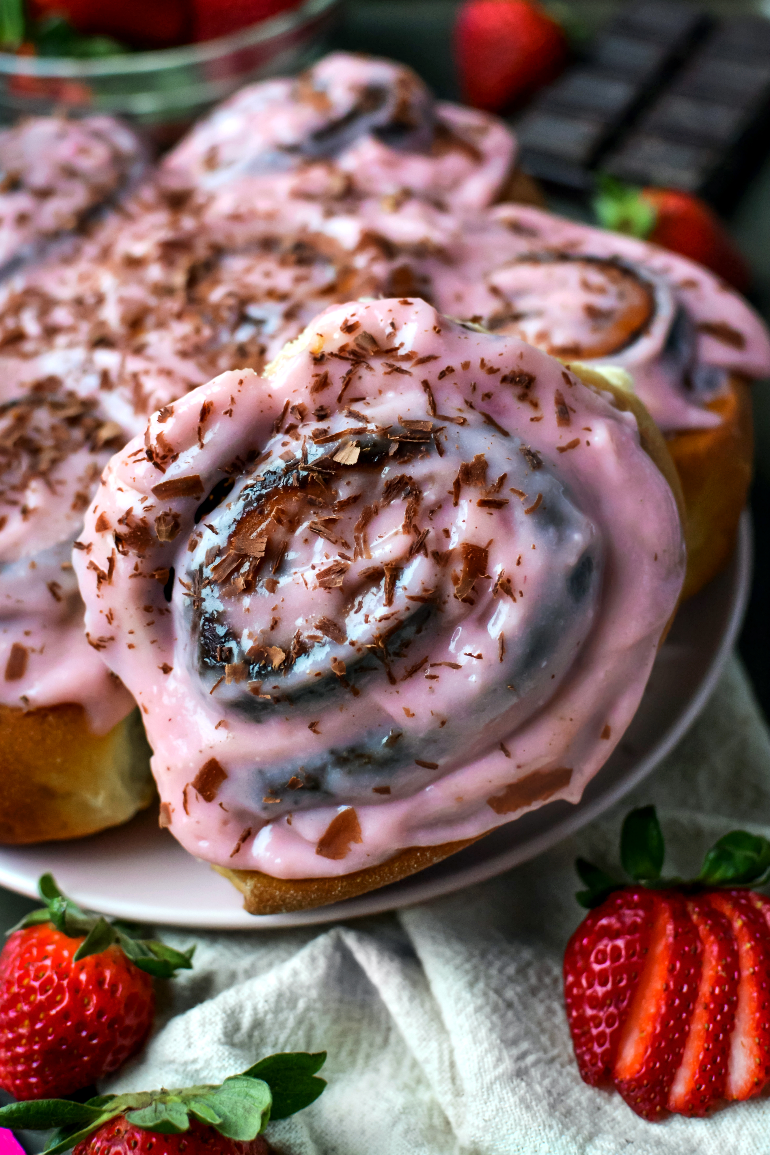 vegan chocolate rolls with strawberry cream cheese frosting