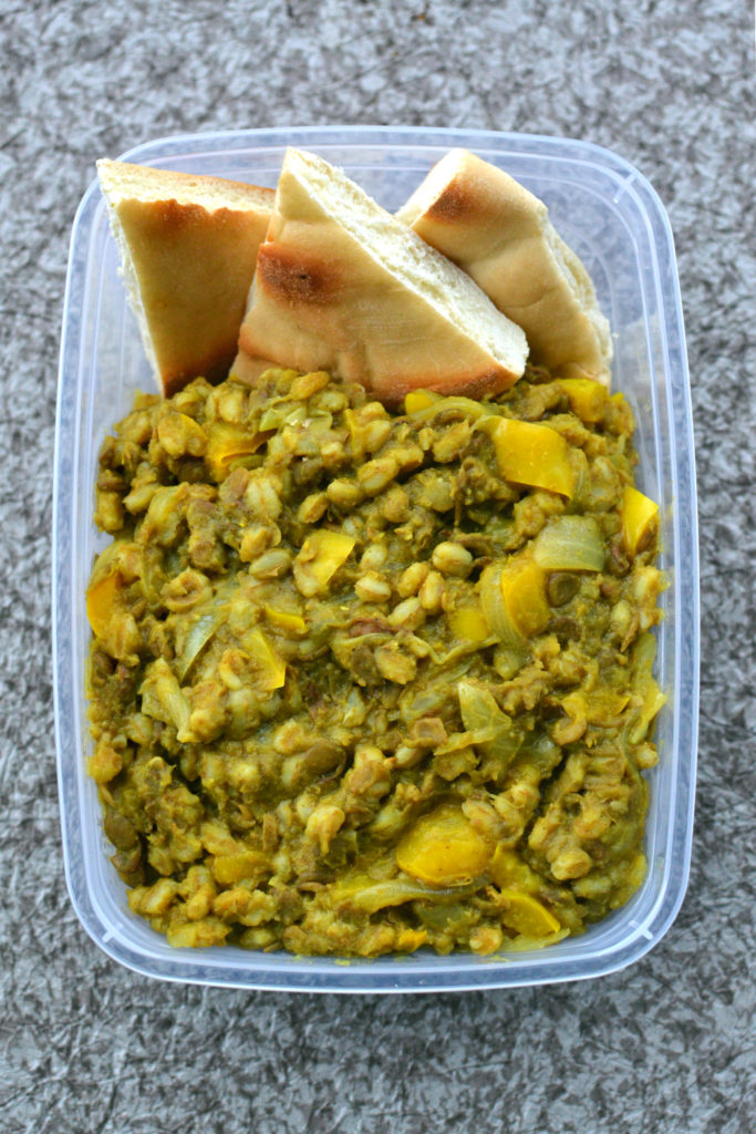 turmeric stew with lentils and pita bread