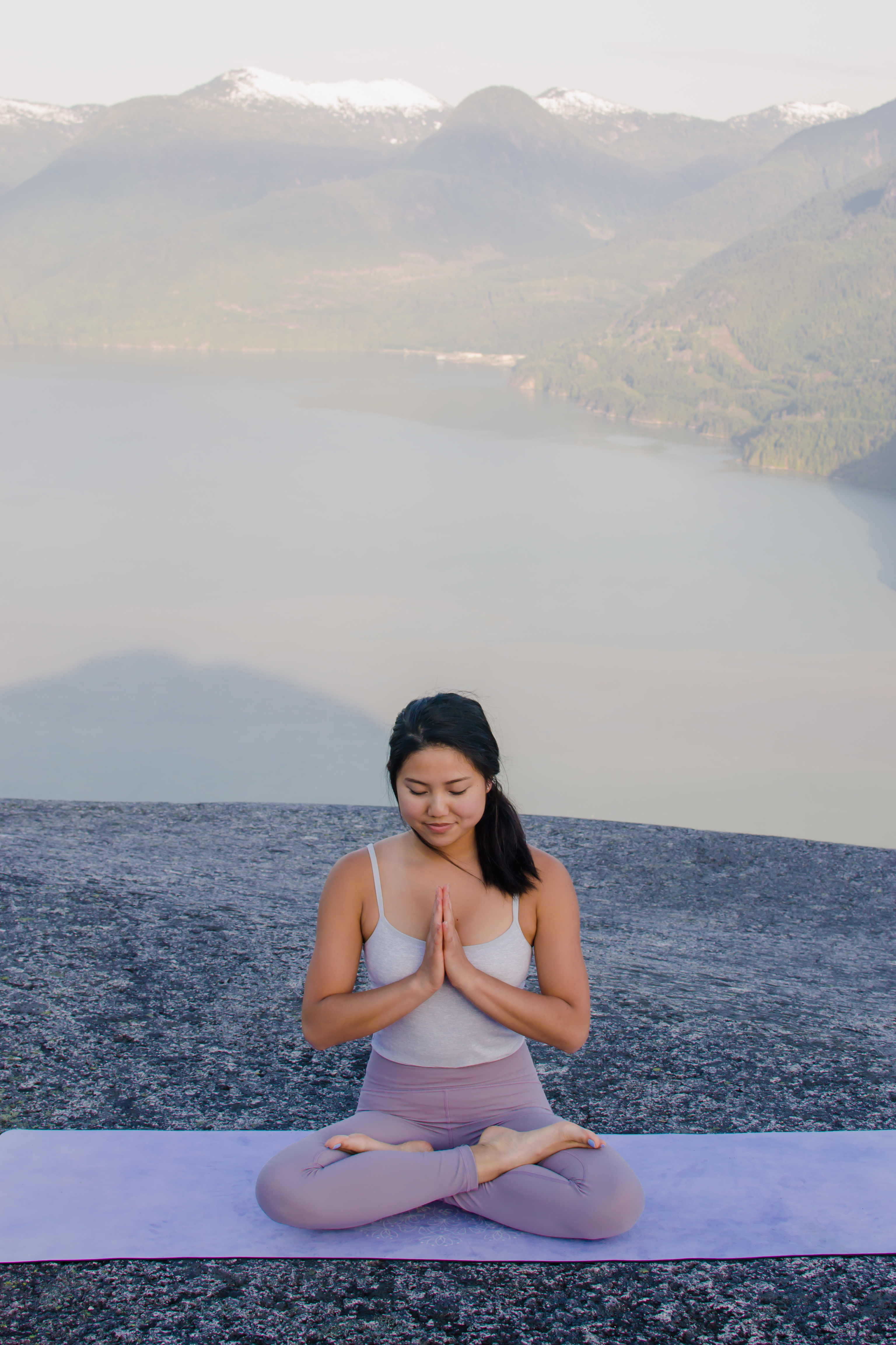 seated lotus pose yoga mountains
