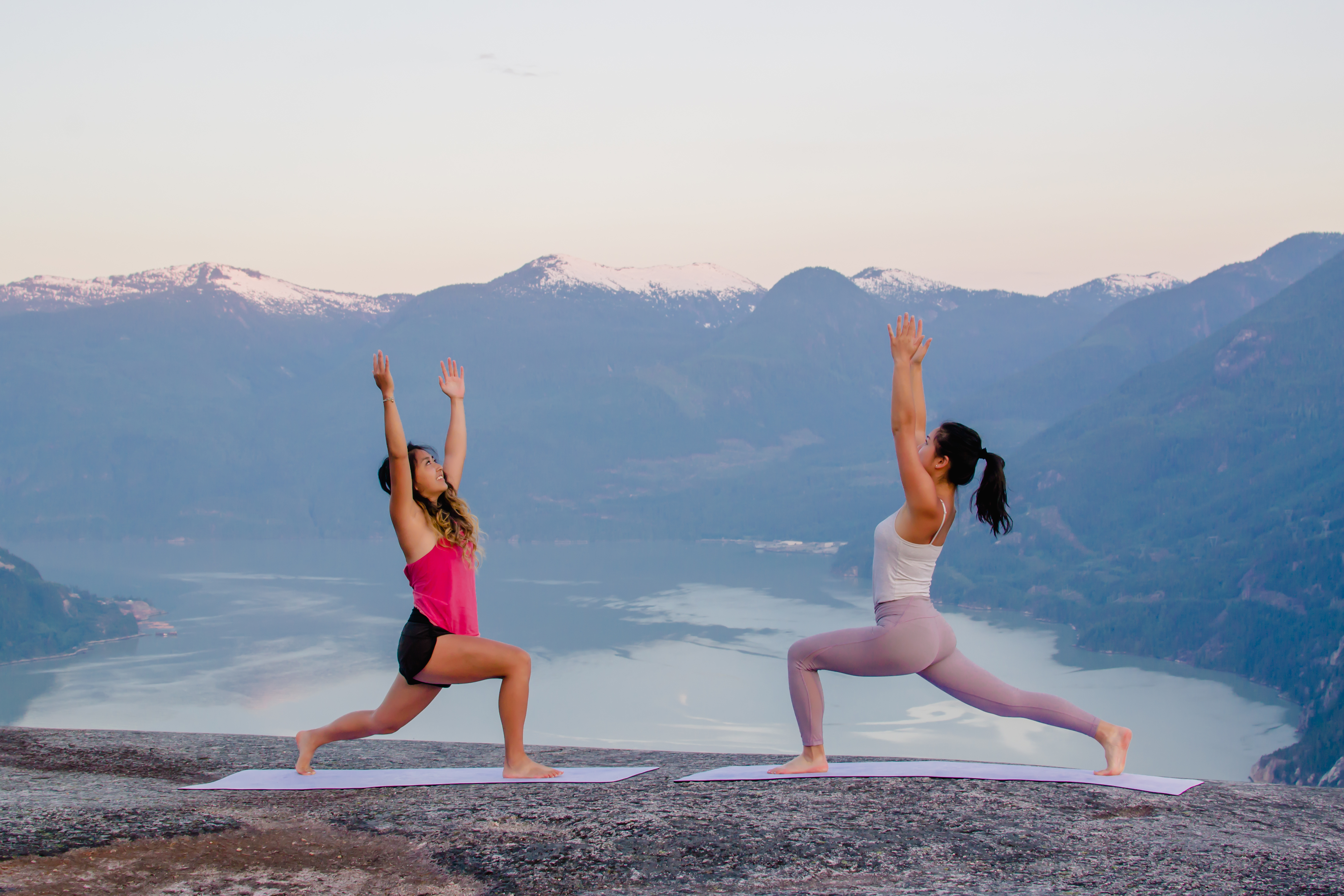 crescent lunge yoga pose at sunrise